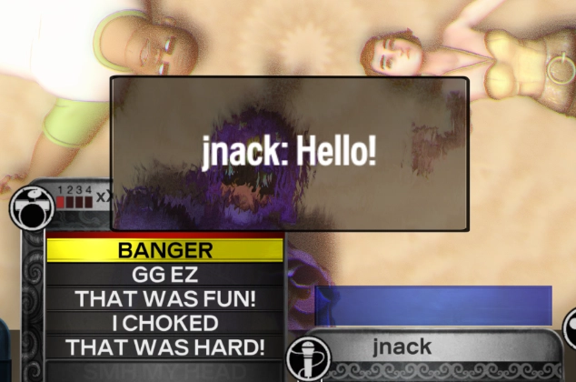 Rock Band 3 Deluxe in an online lobby. On the left are various Quick Chat messages and an online player sent a 'Hello!' message.