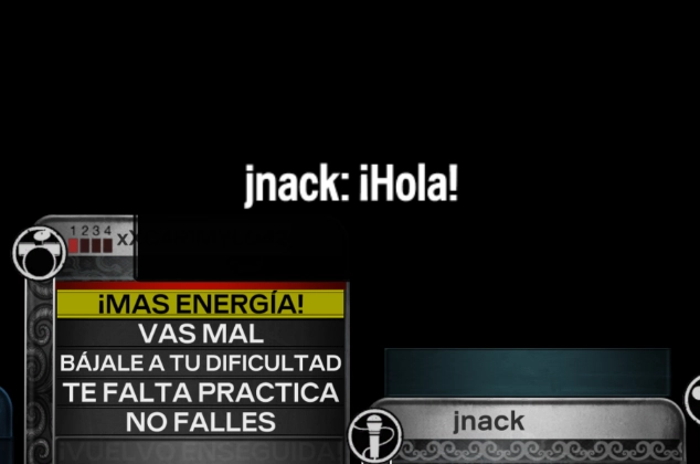Una sesión de online dentro de Rock Band 3 Deluxe. En el lado izquierdo hay varios mensajes de la Chat Rápida y un jugador conectado mandó un mensaje que dice 'Hola!'.